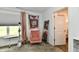 Bright bedroom featuring stylish decor, a comfortable chair, and artistic accents at 6883 Honeysuckle Way, Pendleton, IN 46064
