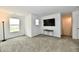 Bonus room offers wall-mounted tv and lots of natural light at 6883 Honeysuckle Way, Pendleton, IN 46064