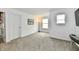 Bonus room with lots of natural light and wall-mounted TV at 6883 Honeysuckle Way, Pendleton, IN 46064