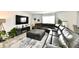 Spacious living room featuring a large sectional sofa, entertainment center, and stylish decor at 6883 Honeysuckle Way, Pendleton, IN 46064
