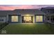 Expansive backyard featuring a well-maintained lawn and covered patio, ideal for outdoor living and entertaining at 7154 Covington St, Lebanon, IN 46052