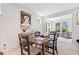 Eat in dining area featuring hardwood floors, neutral walls, and plenty of natural light at 7154 Covington St, Lebanon, IN 46052
