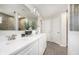 Modern bathroom with double sinks, quartz countertops, and stylish fixtures at 7177 Firestone Rd, Whitestown, IN 46052