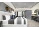 Beautiful main bedroom with stylish decor, a large bed, and ample natural light at 7177 Firestone Rd, Whitestown, IN 46052