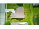 Overhead view of the property with a deck featuring outdoor seating and landscaped backyard near a pond at 7212 Maple Bluff Pl, Indianapolis, IN 46236