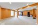 Large basement with carpet and many windows at 7212 Maple Bluff Pl, Indianapolis, IN 46236