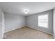 Bedroom featuring carpet floors, overhead lighting, and ample natural light at 7212 Maple Bluff Pl, Indianapolis, IN 46236