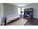 Bedroom with neutral carpet, two windows, and office furniture at 7212 Maple Bluff Pl, Indianapolis, IN 46236