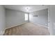 Bedroom featuring carpet floors, overhead lighting, and ample natural light at 7212 Maple Bluff Pl, Indianapolis, IN 46236