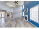 Impressive living room showcasing tall ceilings, a fireplace, and great natural light at 7212 Maple Bluff Pl, Indianapolis, IN 46236