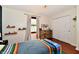 Charming bedroom featuring natural light, hardwood floors, and decor at 7242 Highburry Dr, Indianapolis, IN 46256