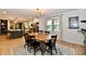 Dining area adjacent to an updated kitchen with granite countertops and stainless steel appliances at 7242 Highburry Dr, Indianapolis, IN 46256