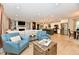 Spacious living area open to a kitchen with stainless steel appliances and a dining area at 7242 Highburry Dr, Indianapolis, IN 46256