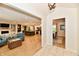 Open concept living room featuring an eat-in kitchen and a separate dining area at 7242 Highburry Dr, Indianapolis, IN 46256