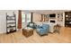 Comfortable living room with built-in shelving, a fireplace, and plenty of natural light at 7242 Highburry Dr, Indianapolis, IN 46256