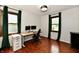Functional home office with natural light, sleek desk, and modern ergonomic chair at 7242 Highburry Dr, Indianapolis, IN 46256
