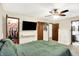 Bright, airy bedroom with ceiling fan, ensuite bathroom and walk-in closet at 7504 Troon Ct, Indianapolis, IN 46237