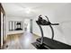 Spacious bedroom with ceiling fan, wood floors, and good natural lighting at 7504 Troon Ct, Indianapolis, IN 46237