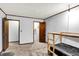 Neutral bedroom with closet and doorway to hallway and ensuite bathroom at 7504 Troon Ct, Indianapolis, IN 46237
