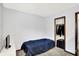 Simple bedroom featuring a closet with an open door at 7504 Troon Ct, Indianapolis, IN 46237