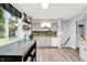 Inviting eat-in kitchen filled with natural light, showcasing stylish accents and modern flooring at 7504 Troon Ct, Indianapolis, IN 46237