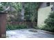 Backyard with a fence and driveway, offering privacy and parking space at 783 Woodruff Place Middle Dr, Indianapolis, IN 46201