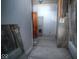 Bathroom in need of repair including a tub behind a shower curtain at 783 Woodruff Place Middle Dr, Indianapolis, IN 46201