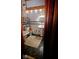 View of a bathroom that includes a tub, toilet, sink, and tiled walls at 783 Woodruff Place Middle Dr, Indianapolis, IN 46201