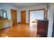 Bright bedroom featuring hardwood floors and original trim throughout at 783 Woodruff Place Middle Dr, Indianapolis, IN 46201