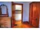 Bedroom featuring natural light, hardwood floors, and ample closet space at 783 Woodruff Place Middle Dr, Indianapolis, IN 46201