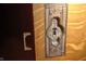 An intricate close-up of an antique doorknob and escutcheon on a wooden door at 783 Woodruff Place Middle Dr, Indianapolis, IN 46201