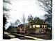 Vintage home on a tree-lined street, blending classic architecture with natural beauty at 783 Woodruff Place Middle Dr, Indianapolis, IN 46201