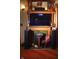 Close-up of a fireplace with wood mantle, creating a warm and inviting atmosphere at 783 Woodruff Place Middle Dr, Indianapolis, IN 46201