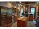 Spacious kitchen with stainless steel appliances and wood trim at 783 Woodruff Place Middle Dr, Indianapolis, IN 46201