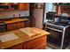 Kitchen with stainless steel appliances and wooden island at 783 Woodruff Place Middle Dr, Indianapolis, IN 46201