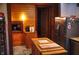 Kitchen featuring wooden cabinets, stainless steel refrigerator and wood trim at 783 Woodruff Place Middle Dr, Indianapolis, IN 46201