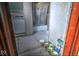 View of a laundry room that leads to a bathroom with a tub at 783 Woodruff Place Middle Dr, Indianapolis, IN 46201