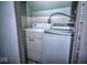 Tight laundry room with a washer and dryer at 783 Woodruff Place Middle Dr, Indianapolis, IN 46201