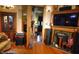 Cozy living room featuring hardwood floors, a fireplace, and classic decor at 783 Woodruff Place Middle Dr, Indianapolis, IN 46201