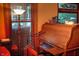 Cozy office space featuring a roll-top desk, vintage typewriter, and stained glass window at 783 Woodruff Place Middle Dr, Indianapolis, IN 46201