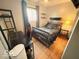 This bedroom includes a twin bed and a desk, providing an efficient and comfortable space at 8990 N 850 W, Fairland, IN 46126