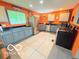 Well-equipped kitchen with stainless steel appliances, tile flooring, and ample counter space at 8990 N 850 W, Fairland, IN 46126