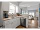 Bright kitchen featuring stainless steel appliances and ample cabinet space at 9700 River Oak E Ln, Fishers, IN 46038