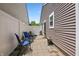 Cozy patio featuring outdoor seating, a privacy fence, and access to the home at 9700 River Oak E Ln, Fishers, IN 46038