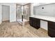 Bathroom with a tiled floor, glass-enclosed shower, and a spacious vanity at 10112 James Run Dr, Indianapolis, IN 46239