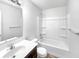 A pristine bathroom with a vanity, mirror, and a shower-tub combination at 10112 James Run Dr, Indianapolis, IN 46239