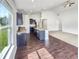 Spacious kitchen with dark cabinetry, stainless steel appliances, and a central island at 10112 James Run Dr, Indianapolis, IN 46239