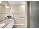 Bright bathroom featuring a double vanity with ample counter space, updated fixtures, and a glass-enclosed shower at 1056 Hilltop Commons Blvd, Whiteland, IN 46184
