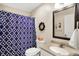 Bright bathroom featuring modern fixtures, including a shower with a decorative blue shower curtain at 1056 Hilltop Commons Blvd, Whiteland, IN 46184