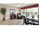 Bright breakfast nook features a comfortable chair and outdoor views at 1056 Hilltop Commons Blvd, Whiteland, IN 46184